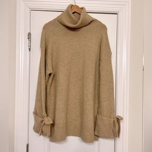 Zara cowl neck sweater with bow detail on sleeves. Size medium.